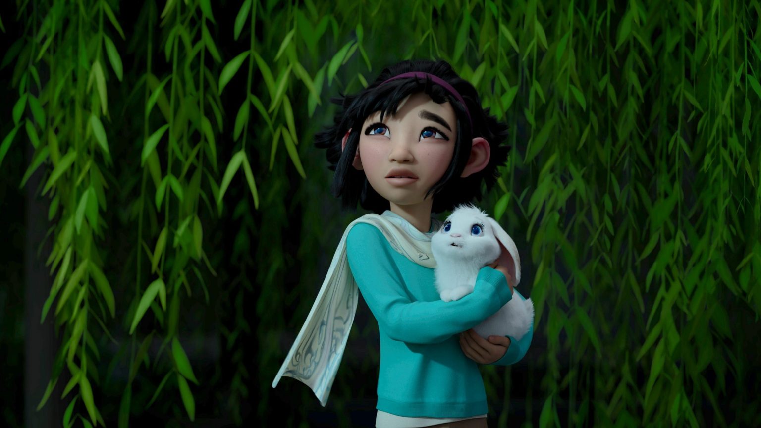 Fei Fei looks up to the sky while holding her pet rabbit in 'Over the Moon.'