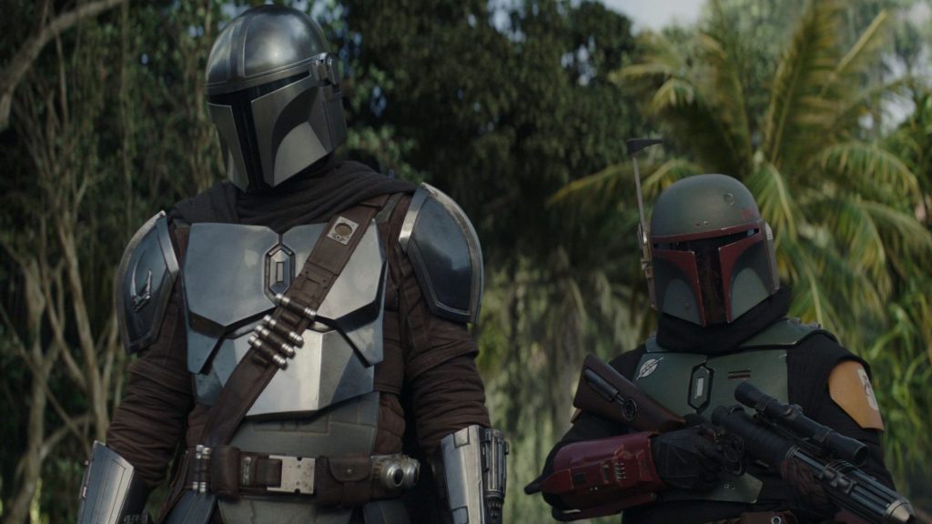Pedro Pascal's Mando next to a Boba Fett with clean new armor as seen in Chapter 15 of 'The Mandalorian'.