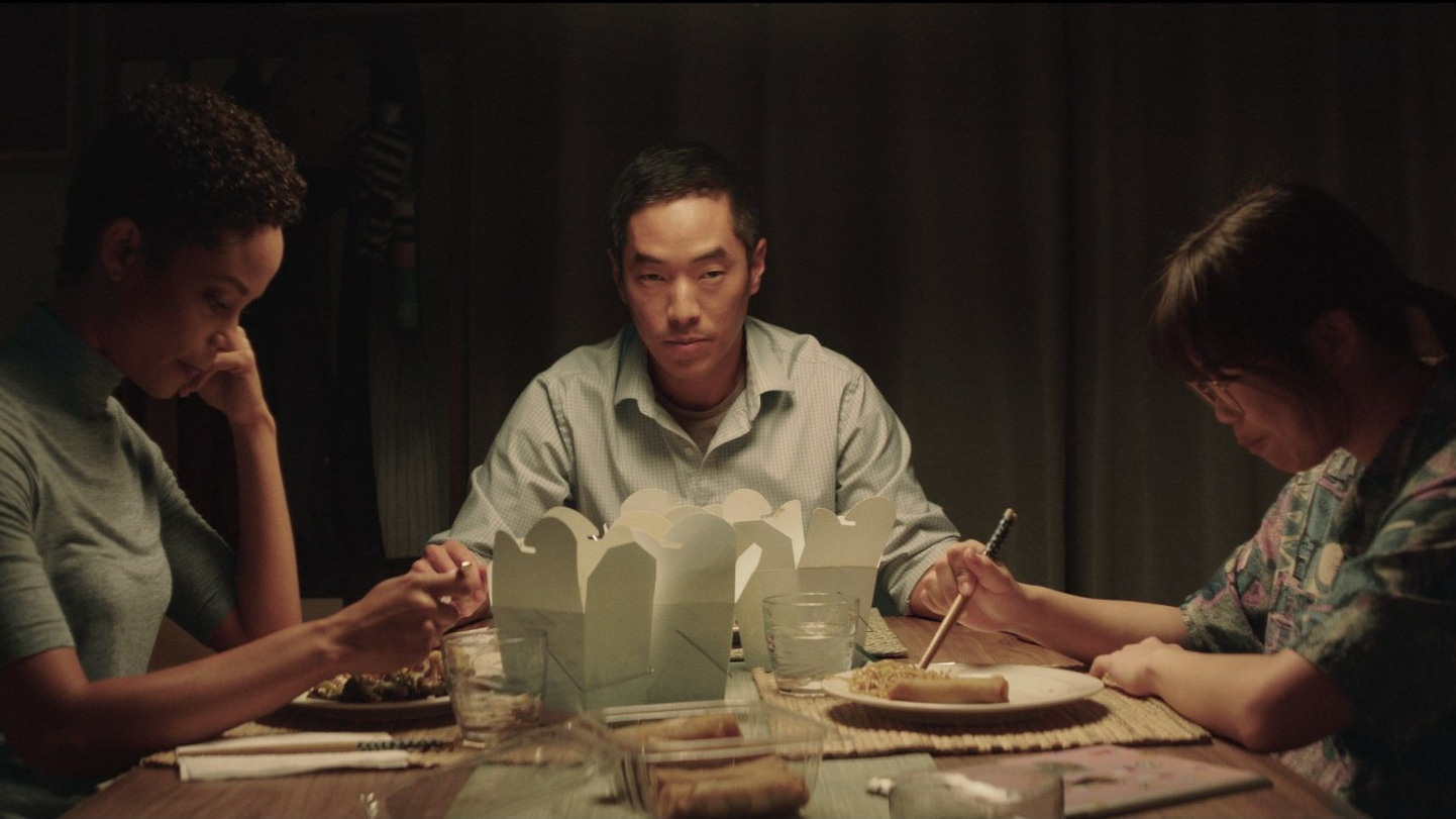 Paulina Lule, Leonardo Nam, & Kannon sharing an awkward meal at the dinner table as seen in Marvelous and the Black Hole. 