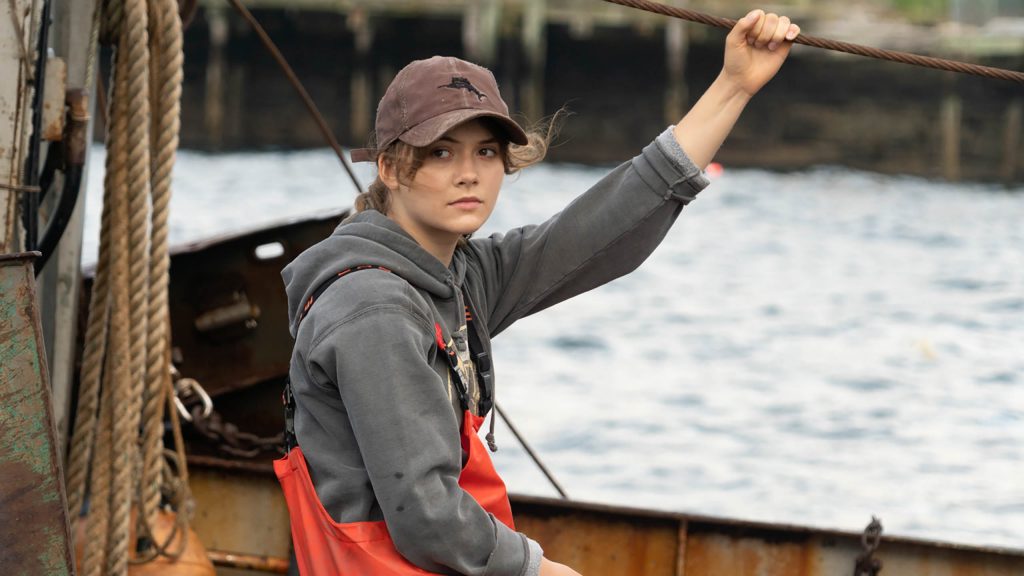 Emilia Jones on a fishing boat as seen in the Sundance 2021 film CODA.