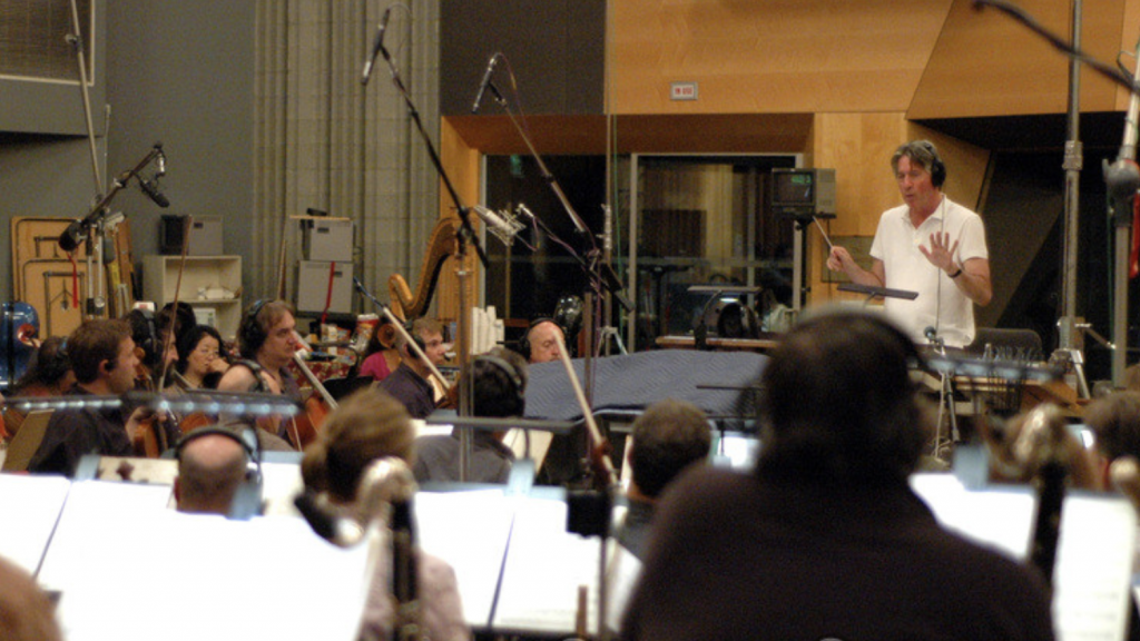 Composer Alan Silvestri conducting the Hollywood Studio Symphony during a recording session for Night at the Museum at the Newman Scoring Stage. 