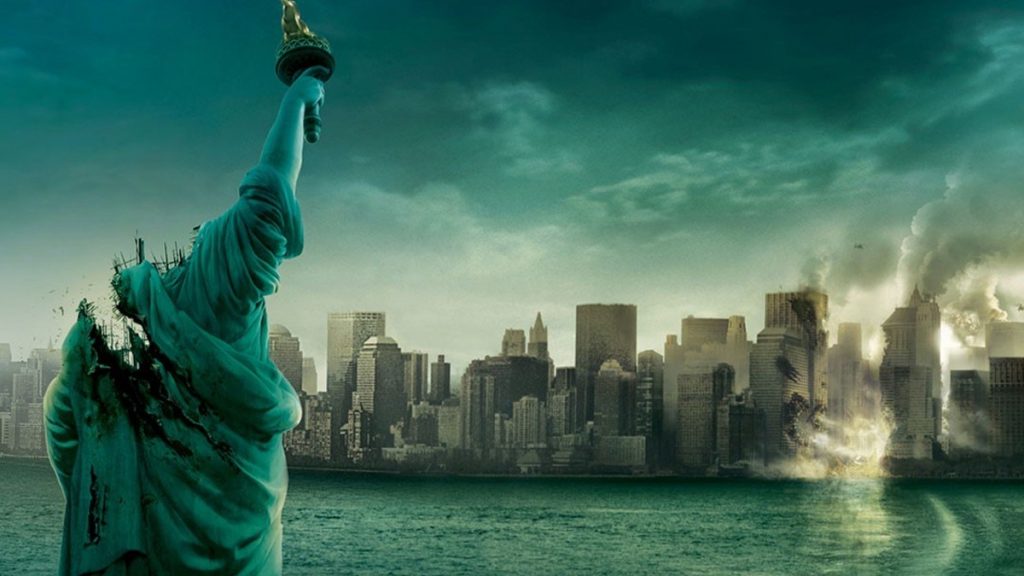 The poster for Cloverfield directed by Matt Reeves featuring the headless Statue of Liberty facing a destroyed New York.