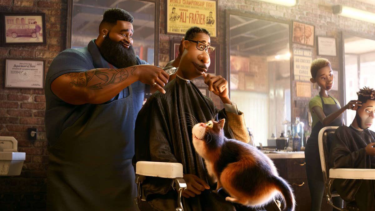 Joe Gardner getting a haircut at his local barbershop while his cat sits on his lap as seen in Soul directed by Pete Docter. 