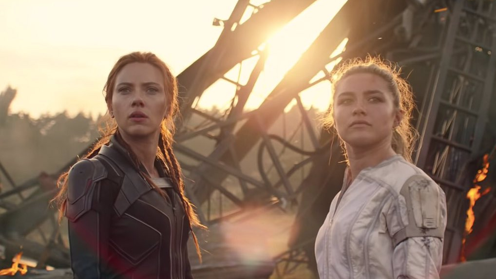 Scarlett Johansson as Natasha Romanoff next to Florence Pugh as Yelena Belova in a battlefield as seen in Marvel's BLACK WIDOW written by Eric Pearson.
