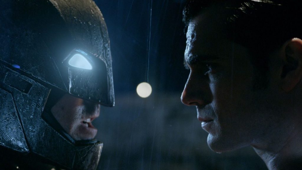 Ben Affleck as an armoed Batman faces off against Henry Cavill as Superman as seen in BATMAN V SUPERMAN: DAWN OF JUSTICE, coming in the ninth spot in our DCEU ranking from worst to best.