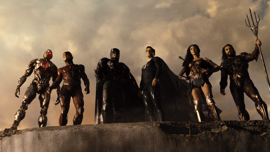 All 6 members of the Justice League stand together with the new black suit Superman as seen in ZACK SNYDER'S JUSTICE LEAGUE, coming in at number 7 in our DCEU ranking from worst to best.
