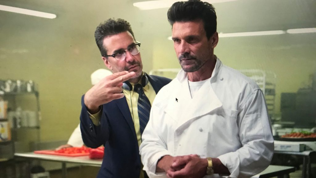 Director and writer James DeMonaco stages a scene with actor Frank Grillo on the set of THIS IS THE NIGHT.