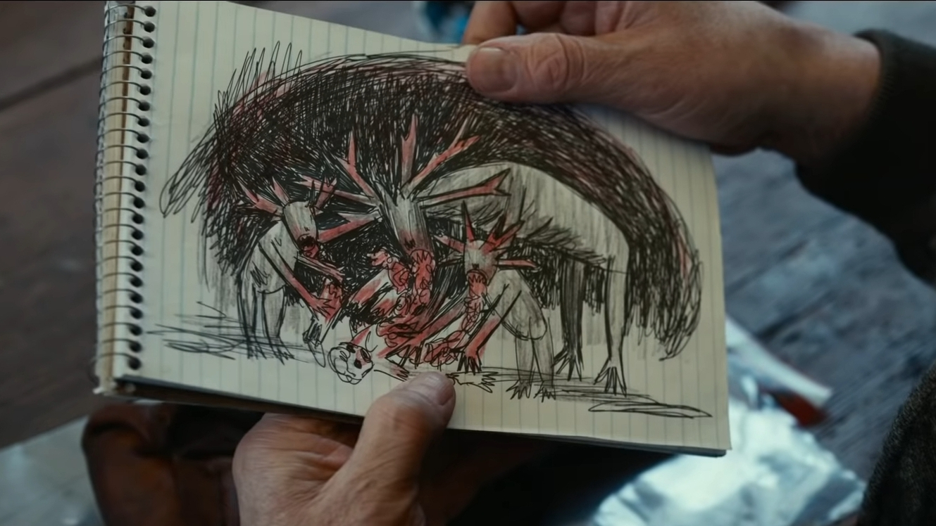 A horrific child's drawing of a family of bloodthirsty Wendigo feasting on a helpless human in red and black ink as seen in the new horror film ANTLERS directed by Scott Cooper and produced by Guillermo Del Toro.