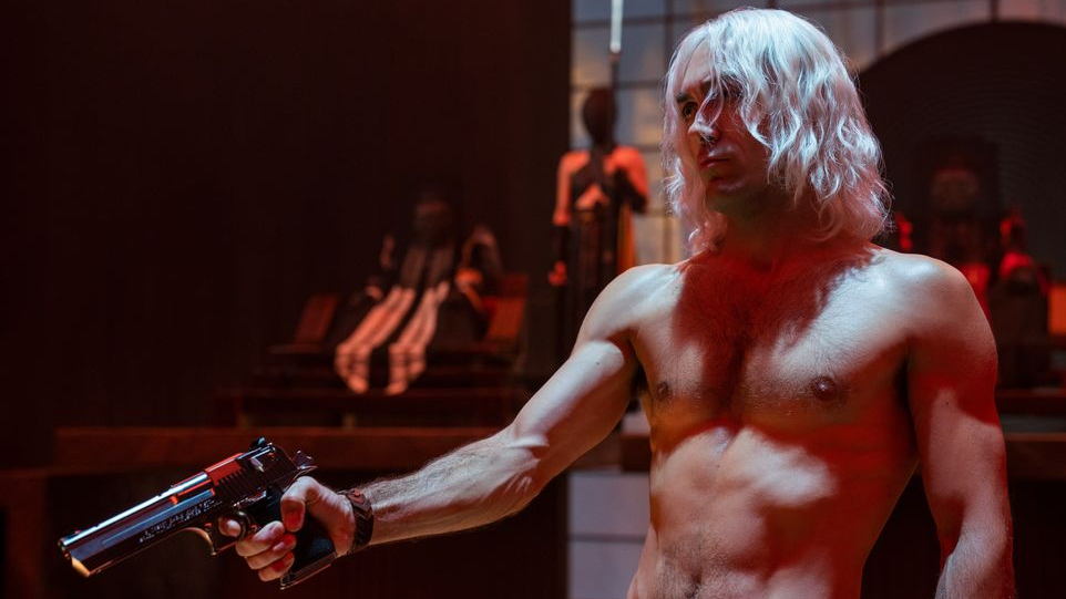 Alex Hassell as the main villain Vicious shirtless and holding a gun in the Netflix live-action adaptation of COWBOY BEBOP. 