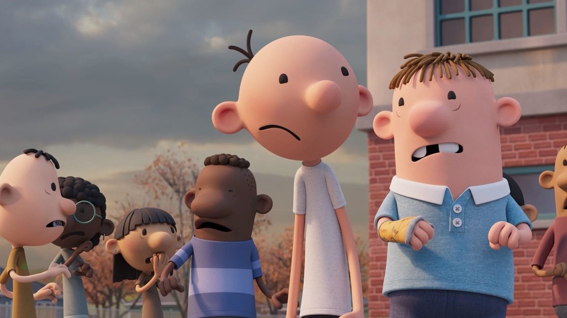 Greg Heffley and Rowly Jefferson stand together in disgust on a school yard as seen in the new DIARY OF A WIMPY KID animated reboot on Disney+ written by original author Jeff Kinney. 