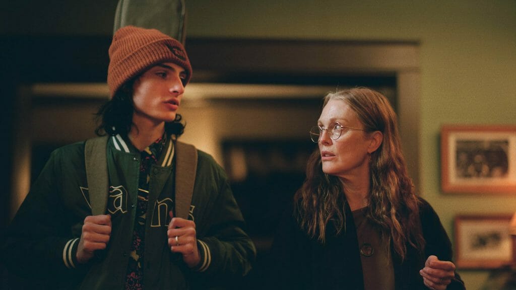 Finn Wolfhard and Julianne Moore as mother and son in the directorial debut of Jesse Eisenberg WHEN YOU FINISH SAVING THE WORLD.