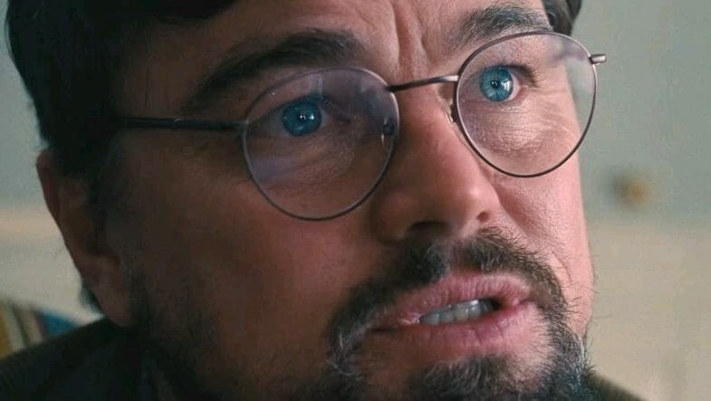 A close up of a nervous Leonardo DiCaprio about to reveal the news of a world-ending comet about to hit earth as shot by cinematographer Linus Sandgren in DON'T LOOK UP. 