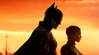 Batman and Catwoman stand together over the Gotham City sunset from THE BATMAN directed by Matt Reeves and produced by Dylan Clark.