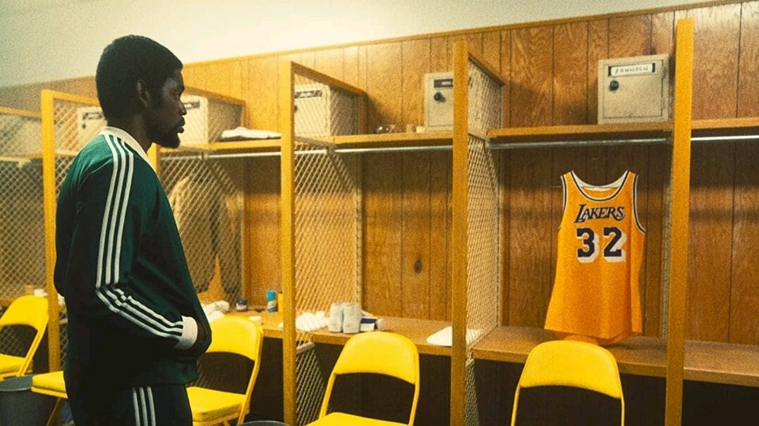 Quincy Isaiah as Magic Johnson starring as his iconic number 32 gold and purple Lakers jersey from inside the team's locker room in WINNING TIME: THE RISE OF THE LAKERS DYNASTY. 