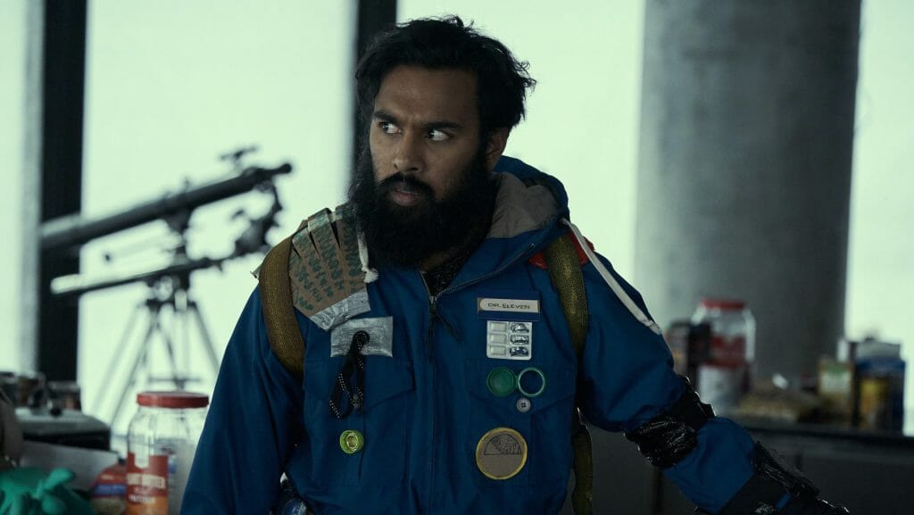 Himesh Patel prepares to leave quarantine with travel gear in the HBO Max original limited series STATION ELEVEN.