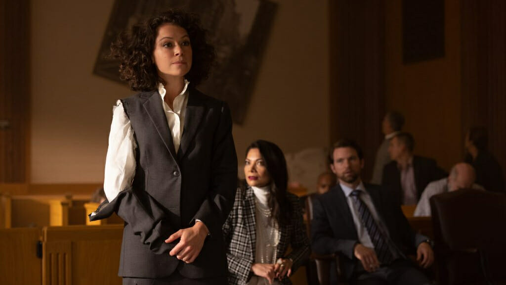Jennifer Walters played by Tatiana Maslany prepares to give her closing statement in a destroyed courtroom while wearing a suit ripped and torn from transforming into the She-Hulk in the Disney+ MCU series SHE-HULK ATTORNEY AT LAW.