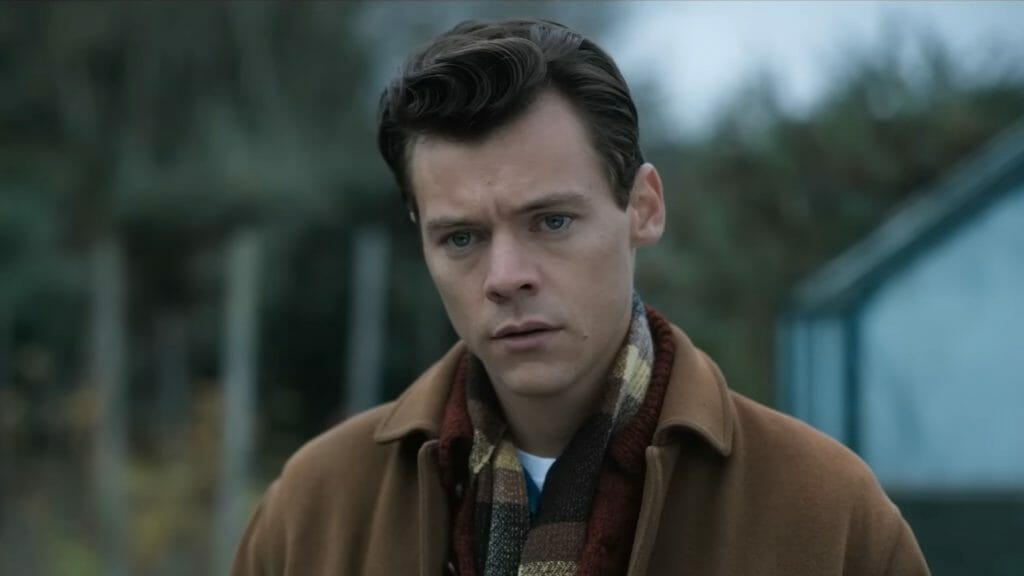 Harry Styles sports a somber expression holding back tears and sadness in MY POLICEMAN on Prime Video.