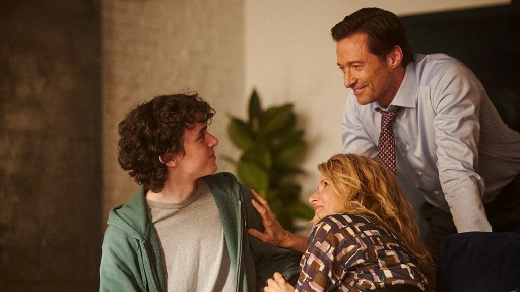 Hugh Jackman and Laura Dern share a comforting moment with their teenage child played by Zen McGrath in THE SON.
