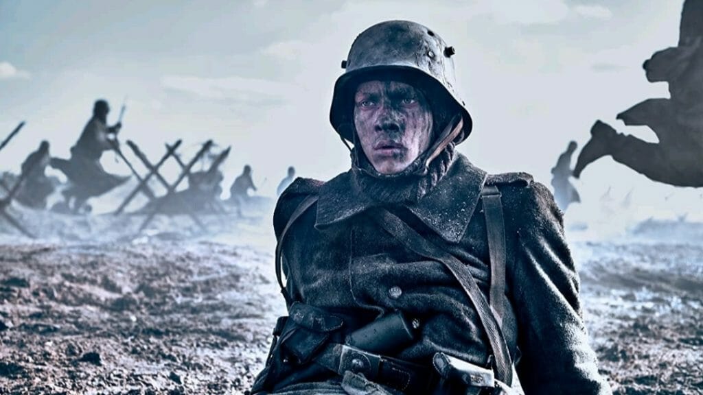 Felix Kammerer plays a German soldier in No Man's Land as explosions surround him during World War I in the Netflix adaptation of ALL QUIET ON THE WESTERN FRONT.