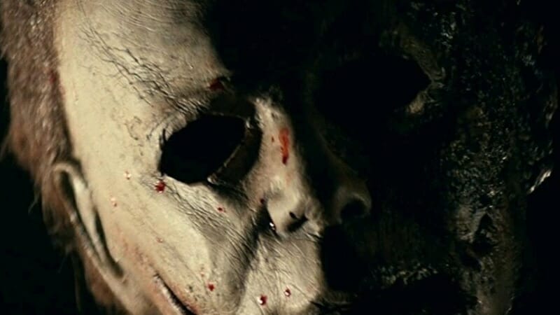 A close up of the Michael Myers mask from HALLOWEEN KILLS which sits right in the middle of our franchise ranked from worst to best list. 