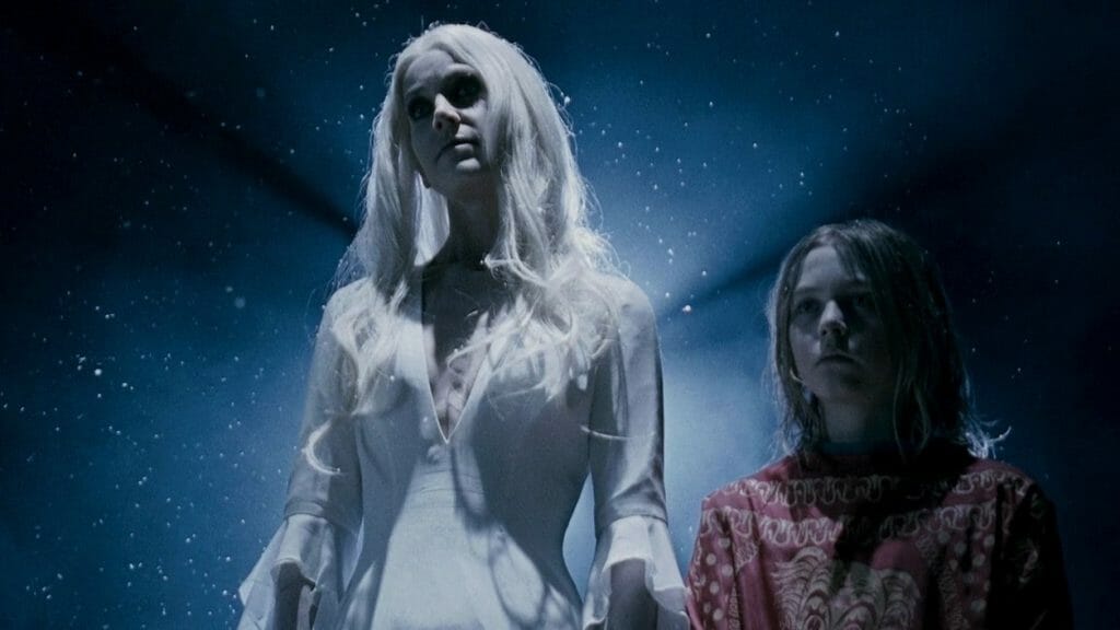 Sheri Moon Zombie as the Ghost of Michael Myers' mother appears with a glowing aura in the Unrated Director's Cut of Rob Zombie's HALLOWEEN 2, which comes in very high in our franchise ranked from worst to best list. 