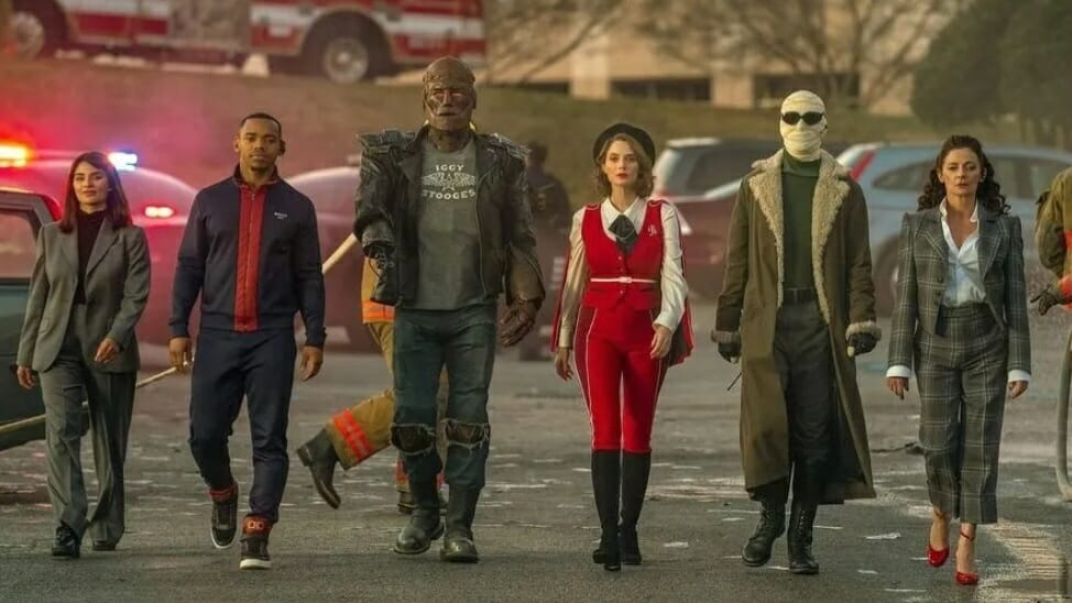 The main team of the Doom Patrol walk in an epic group shot together in Season 4, coming to HBO Max in December 2022.