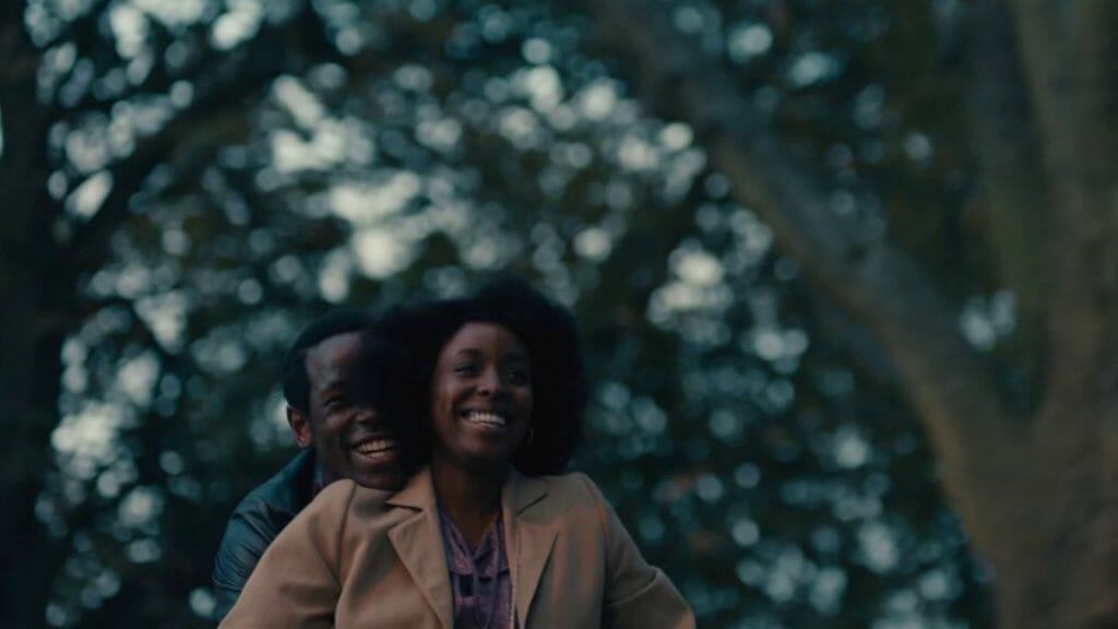 Michael Ward and Amarah-Jae St. Aubyn go on a romantic bike ride together in a beautiful park in LOVERS ROCK on Prime Video, one of our Valentine's Day films to stream for February 2023.
