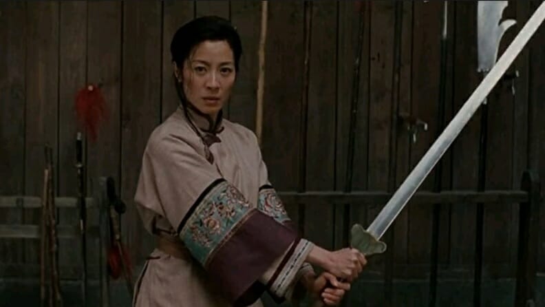 Yu Shu Lien played by Michelle Yeoh wields a mighty sword in the Wuxia martial arts film CROUCHING TIGER, HIDDEN DRAGON directed by Ang Lee.