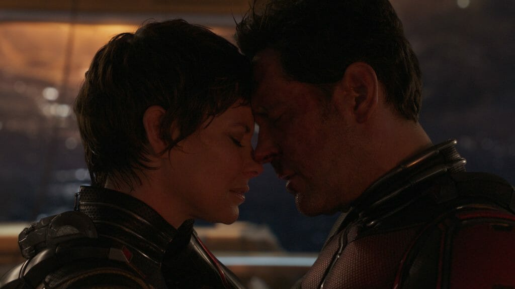 Paul Rudd and Evangeline Lilly embrace each other forehead to forehead in Ant-Man and the Wasp: Quantumania.