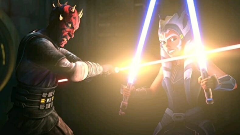 An image of Darth Maul dueling Ahsoka Tano with his classic double bladed red lightsaber in the final season of STAR WARS: THE CLONE WARS on Disney+ for our full list of every Star Wars TV show ranked worst to best.