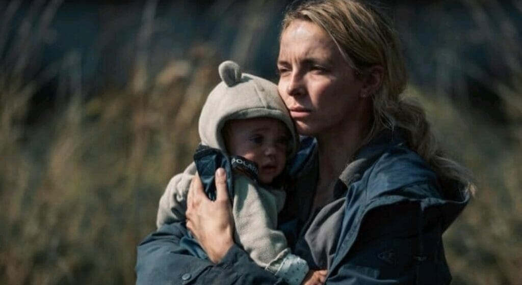 Jodie Comer stars as a mother survivor carrying her newborn baby alone across a dystopian wasteland in the movie THE END WE START FROM.