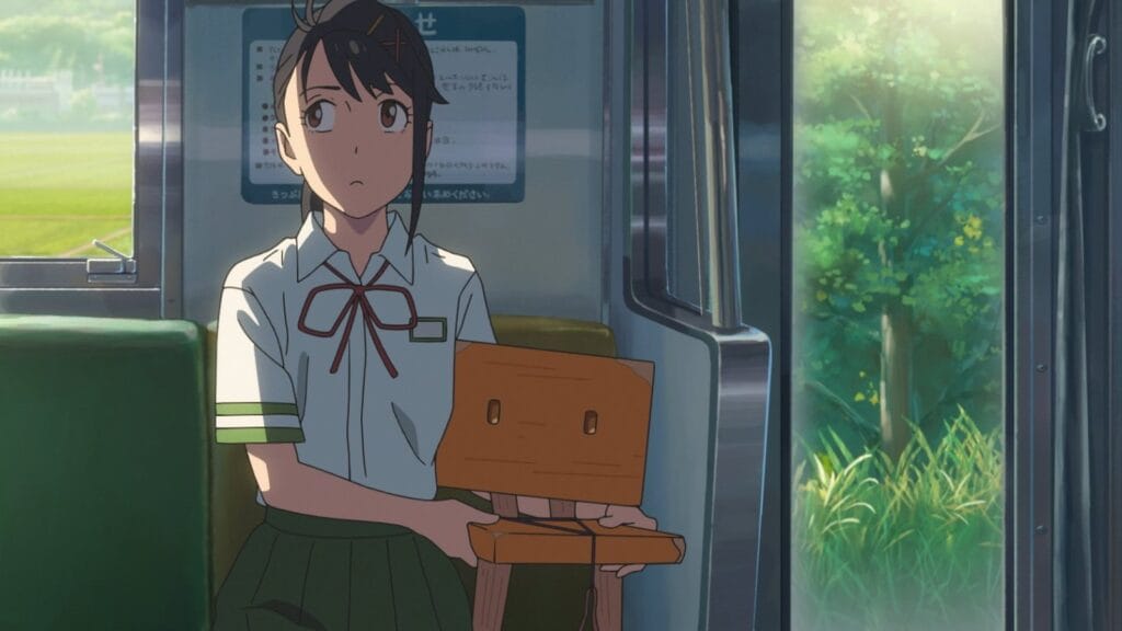 Suzume Iwato sits down with the small Souta chair in the anime SUZUME one of the 10 best animated films of 2023.  