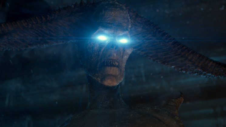 The ancient ice demon spirit Garraka stares with a mad face and glowing eyes in GHOSTBUSTERS: FROZEN EMPIRE. 