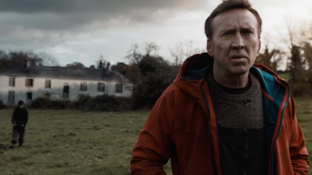 Nicolas Cage stars as the character Paul, the father of two adopted twin sons, in the post-apocalyptic survival thriller film ARCADIAN.