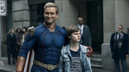 ‘The Boys’ Season 4 Review – An Exercise in Priorities Homelander played by Antony Starr hugs his young son Ryan in public while people watch in disgust in THE BOYS Season 4 on Prime Video.