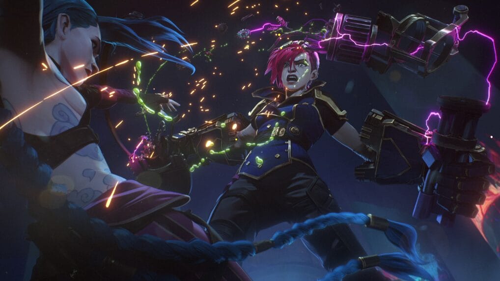 Vi rips Jinx's gatlin gun in half, revealing all of its electric wires, using her atlas gauntlets during an epic fight scene from ARCANE Season 2 on Netflix