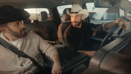 Ben Affleck and Jon Bernthal in a car together in a promo for the premiere of 'The Accountant 2'