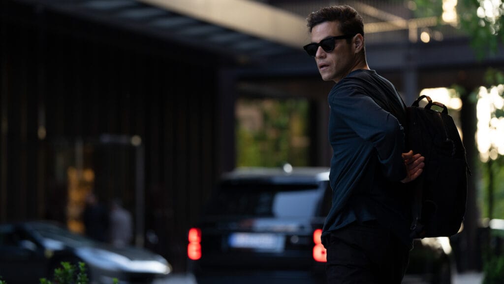 Rami Malek sports some cool black sunglasses as he goes undercover in the espionage spy thriller THE AMATEUR.