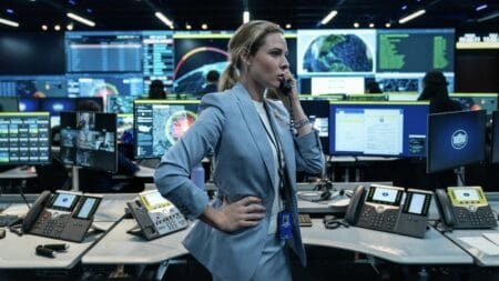 ‘A House of Dynamite’ Review – A Poor Excuse for a Political Thriller | Venice 2025 Rebecca Ferguson stars as high-ranking U.S. military official Olivia Walker taking a tense phone call in the middle of an emergency command center that is monitoring an incoming nuclear missile on the United States in the Netflix movie A HOUSE OF DYNAMITE.