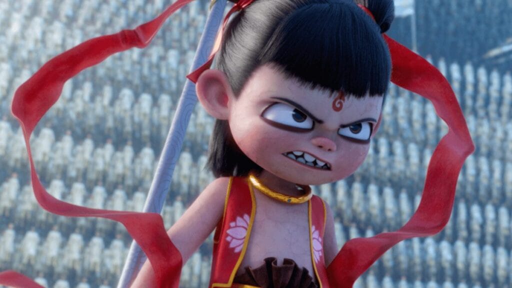 The young mythological Chinese prince Nezha strikes a battle pose with his powerful staff in the animated sequel and global box office hit NE ZHA 2, which is included in the HBO Max December 2025 list of new movies and TV shows.