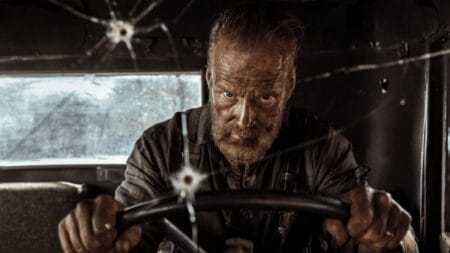 ‘Sisu: Road to Revenge’ Review – Explosive Action Sequel is a Huge Improvement An intense close-up of Jorma Tommila as legendary Finnish army commando Aatami Korpi driving a battle damaged truck with a furious look of anger on his face in the movie sequel SISU: ROAD TO REVENGE.