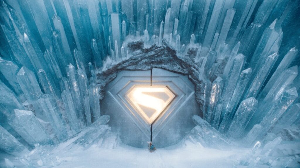 An epic shot of Krypto the Superdog dragging a weakened Superman into the icy Fortress of Solitude in James Gunn's SUPERMAN, produced by Warner Bros. and DC Studios.  