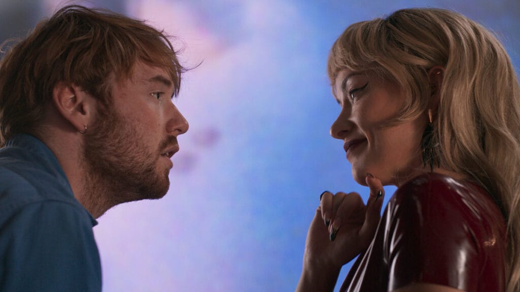 ‘I Want Your Sex’ Review – Gregg Araki Returns with an Intelligent Erotic Comedy Cooper Hoffman and Olivia Wilde stare passionately into each other at a colorful art gallery in Gregg Araki's comeback film I WANT YOUR SEX.