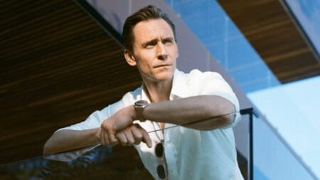 Tom Hiddleston returns as British spy Jonathan Pine looking sleek in a white button down shirt in THE NIGHT MANAGER Season 2, which is included in the Prime Video January 2026 list of new movies and TV shows.