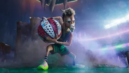 Will Harris, a short teenage Boer goat, tries to pass a basketball over to his teammate on a dangerous court with falling stalactites in Sony Pictures Animation's GOAT.