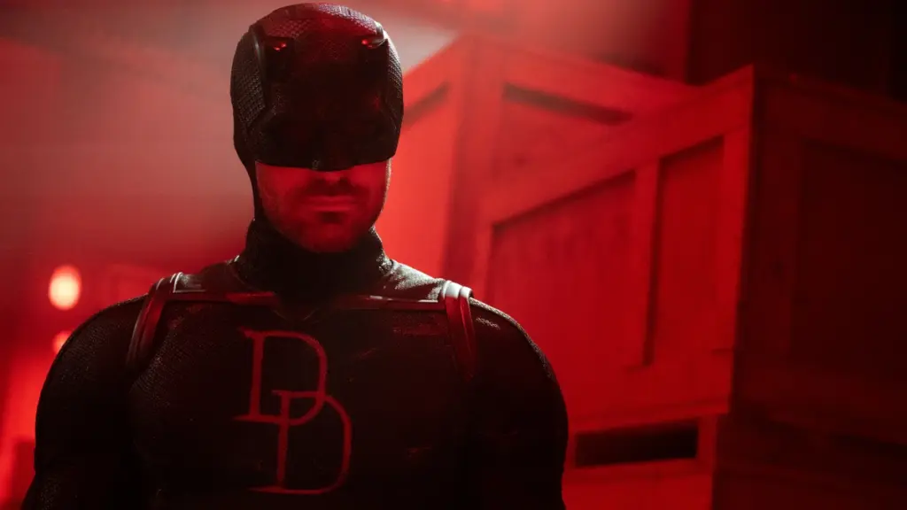 Charlie Cox shows off his new black superhero costume with the iconic red Double D's on his chest in DAREDEVIL: BORN AGAIN Season 2.