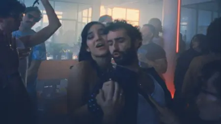 Jordan Firstman dances in the middle of a bustling underground New York night club with his friends in his feature directorial debut film CLUB KID.