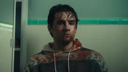 ‘Obsession’ Review – An Insanely Demented Love Story From Curry Barker Michael Johnston stars as the hopeless romantic Bear as he sits in his bathroom covered in dirt and blood with a very regretful facial expression in the cautionary horror film OBSESSION.