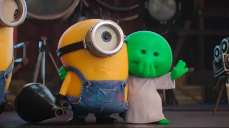 ‘Minions & Monsters’ Review – Illumination Delivers a Hilarious and Heartfelt Ode to Cinema The new Minion with combed hair James meets the evil yet adorably small green Cthulhu-like demon Goomi in the animated sequel MINIONS & MONSTERS.