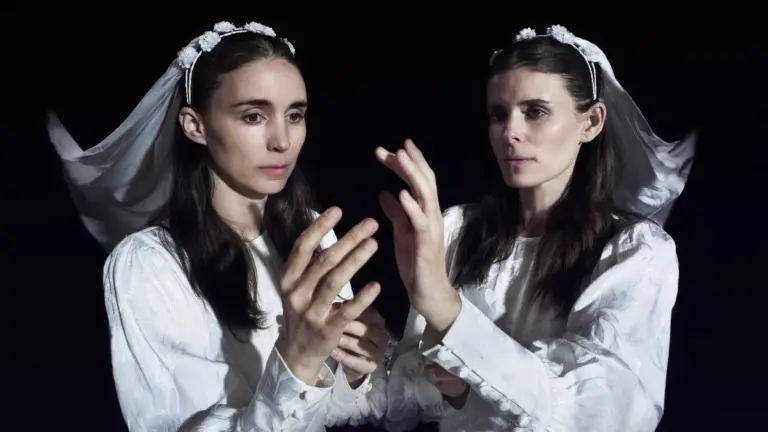 Kate and Rooney Mara star as the inseparable twin sisters Jean and Joan Holbrooke wearing beautiful white gowns in the movie BUCKING FASTARD.